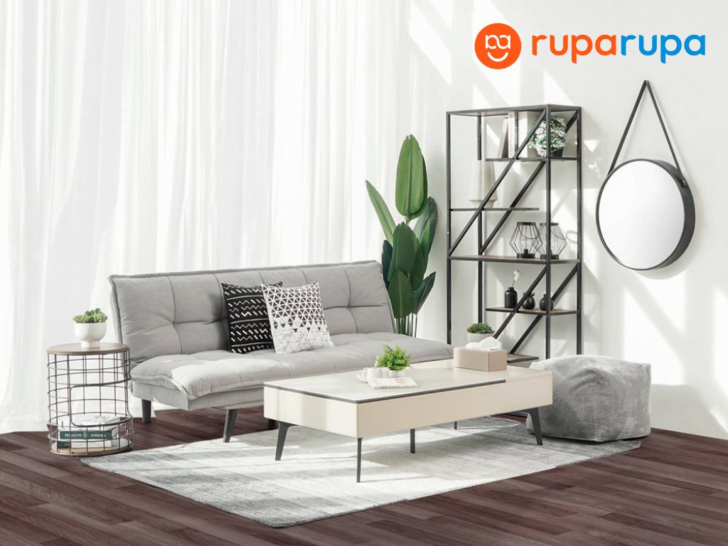 sofa abu-abu dan rak hitam